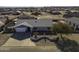 Single story home with landscaped front yard, large driveway and RV parking at 8547 W Magnum Dr, Arizona City, AZ 85123