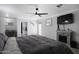 Spacious main bedroom with a large bed and ensuite bathroom access at 8547 W Magnum Dr, Arizona City, AZ 85123