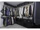 Large walk-in closet with ample shelving and hanging space at 8547 W Magnum Dr, Arizona City, AZ 85123