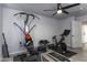 Home gym with Bowflex machine, stationary bike, and treadmill at 8547 W Magnum Dr, Arizona City, AZ 85123