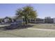 House exterior showcasing a gray house with a white garage door at 8547 W Magnum Dr, Arizona City, AZ 85123