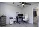 Home office with desk, chair, and ample storage at 8547 W Magnum Dr, Arizona City, AZ 85123