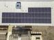 Solar panel array on a residential roof at 8547 W Magnum Dr, Arizona City, AZ 85123