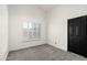 Simple bedroom with a window and a closet at 10484 E Mission Ln, Scottsdale, AZ 85258