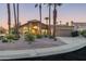 Attractive single-story home with desert landscaping, and a two-car garage at 10484 E Mission Ln, Scottsdale, AZ 85258