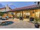 Covered patio with seating and pool view at 10484 E Mission Ln, Scottsdale, AZ 85258