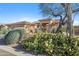 Landscaped yard with cacti and a two-car garage at 11453 E Mark Ln, Scottsdale, AZ 85262