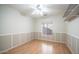 Bright bedroom with wood flooring and ceiling fan at 1274 N Ithica St, Gilbert, AZ 85233