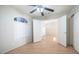 Bright bedroom with laminate flooring and double door closet at 1274 N Ithica St, Gilbert, AZ 85233