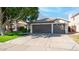 Two-car garage and well-maintained front yard at 1274 N Ithica St, Gilbert, AZ 85233