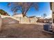 Large backyard with gravel and a patio area at 12810 W Edgemont Ave, Avondale, AZ 85392