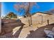 Backyard with patio, gravel area and block wall at 12810 W Edgemont Ave, Avondale, AZ 85392