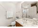 Simple bathroom with a shower/tub combo and wood vanity at 13601 N 50Th Pl, Scottsdale, AZ 85254