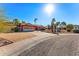 Front yard view of a single-story house with a driveway and landscaping at 13601 N 50Th Pl, Scottsdale, AZ 85254