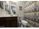 Bathroom with shower/tub combo and patterned curtain at 13658 W Sandridge Dr, Sun City West, AZ 85375