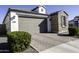 Single-story home with two-car garage and stone accents at 13658 W Sandridge Dr, Sun City West, AZ 85375