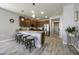 Modern kitchen with granite countertops and breakfast bar at 13658 W Sandridge Dr, Sun City West, AZ 85375