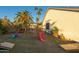 Spacious backyard with a playground set and cornhole boards at 15201 N 61St Ave, Glendale, AZ 85306