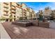 Courtyard with water fountain and seating area at 16 W Encanto Blvd # 409, Phoenix, AZ 85003