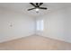 Bright bedroom with ceiling fan and window with shutters at 1722 Leisure World --, Mesa, AZ 85206