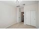 Bedroom with double door closet and neutral decor at 17852 W Country Club Ter, Surprise, AZ 85387