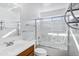 Bathroom with a shower/tub combo and wood vanity at 1803 N Desert Willow St, Casa Grande, AZ 85122