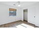 Bedroom with wood flooring and walk-in closet at 1803 N Desert Willow St, Casa Grande, AZ 85122