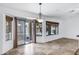 Dining area with view of backyard and pool at 1803 N Desert Willow St, Casa Grande, AZ 85122