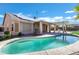 Inviting kidney shaped pool with solar panels at 1803 N Desert Willow St, Casa Grande, AZ 85122