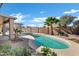 Inviting kidney-shaped pool with brick patio and pergola at 1803 N Desert Willow St, Casa Grande, AZ 85122