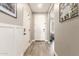 Bright entryway features hard surface floors, leading to other rooms in the home at 1814 W Desert Spring Way, San Tan Valley, AZ 85144