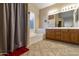 Double vanity bathroom with a shower/tub combo at 1918 E Saratoga St, Gilbert, AZ 85296