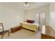 Guest bedroom with ceiling fan and window coverings at 1918 E Saratoga St, Gilbert, AZ 85296