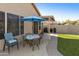 Charming patio with table and chairs, perfect for outdoor dining at 1918 E Saratoga St, Gilbert, AZ 85296