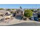 Two-story house with solar panels, driveway, and landscaped yard at 20219 N 33Rd Pl, Phoenix, AZ 85050