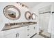 Bathroom with double vanity, granite countertop and walk-in shower at 20219 N 33Rd Pl, Phoenix, AZ 85050