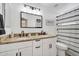 Clean bathroom with double vanity and granite countertop at 20219 N 33Rd Pl, Phoenix, AZ 85050