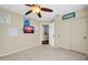 Bright bedroom with a large closet and ceiling fan at 20219 N 33Rd Pl, Phoenix, AZ 85050