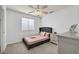 Bedroom featuring a comfy bed and ceiling fan at 20219 N 33Rd Pl, Phoenix, AZ 85050