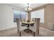 Dining room with round table and four chairs at 20219 N 33Rd Pl, Phoenix, AZ 85050