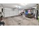 Spacious two-car garage with ample storage shelving at 20219 N 33Rd Pl, Phoenix, AZ 85050