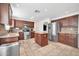 Bright kitchen with an island, stainless steel appliances and granite countertops at 20219 N 33Rd Pl, Phoenix, AZ 85050