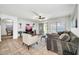 Living room with L-shaped sofa and view of dining area at 20219 N 33Rd Pl, Phoenix, AZ 85050