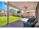 Covered patio with wicker chairs and view of the backyard at 20219 N 33Rd Pl, Phoenix, AZ 85050