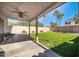 Relaxing covered patio overlooking the grassy backyard at 20219 N 33Rd Pl, Phoenix, AZ 85050