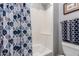 Small bathroom with shower/tub combo and patterned shower curtain at 20546 N 83Rd Pl, Scottsdale, AZ 85255