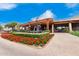 Outdoor patio area at the community clubhouse with red flowers at 20546 N 83Rd Pl, Scottsdale, AZ 85255