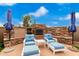 Outdoor patio with stone fireplace, perfect for entertaining at 20546 N 83Rd Pl, Scottsdale, AZ 85255