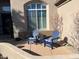 Relaxing patio with two Adirondack chairs, perfect for outdoor enjoyment at 20546 N 83Rd Pl, Scottsdale, AZ 85255