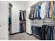 Large walk-in closet with ample shelving and hanging space at 20546 N 83Rd Pl, Scottsdale, AZ 85255